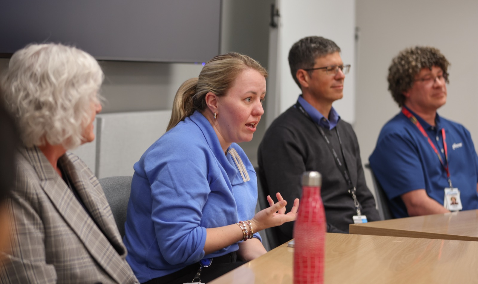 Micron engineers and leaders in discussion with EDGE Scholars